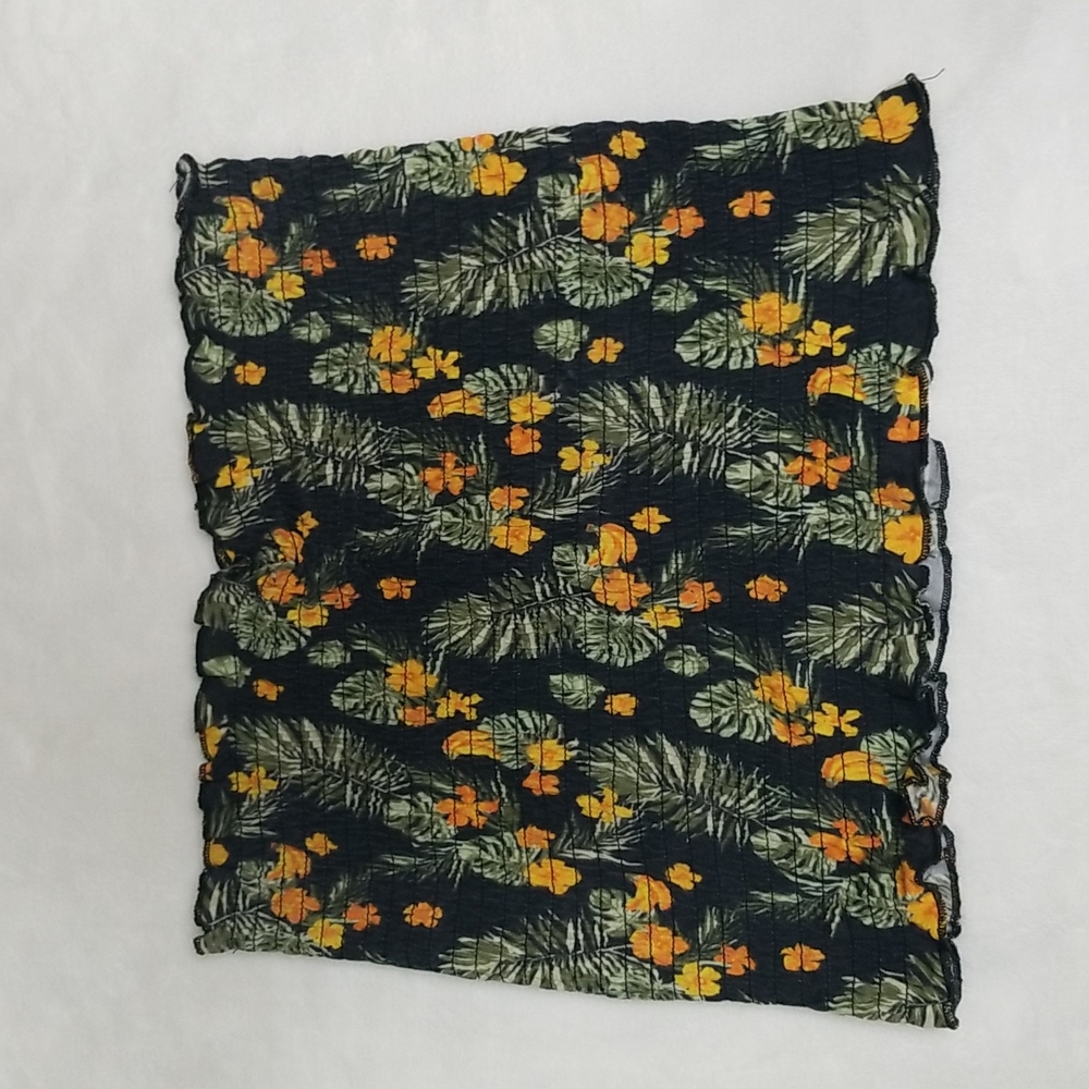 Worn once. Stretchy tube top. Tropical flower pattern. Size S.